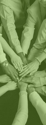 Team photo with hands touching